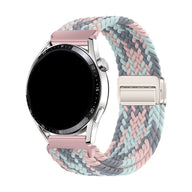Bracelet montre Garmin tressé nylon multicolore rose, gris et bleu pastel avec fermoir magnétique argenté.