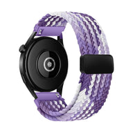 Bracelet montre Garmin tressé nylon dégradé violet blanc avec fermoir magnétique noir.
