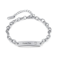 Bracelet gourmette argent en acier inoxydable avec plaque gravée "I Love You" et pierre zirconium, modèle Zoa.