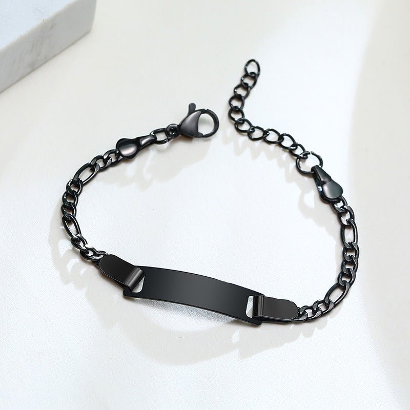 Bracelet gourmette en acier inoxydable noir, maille figaro, plaque lisse à personnaliser, fermeture mousqueton.