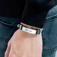 Bracelet gourmette homme acier inoxydable maille milanaise avec plaque personnalisée gravée d'une date.