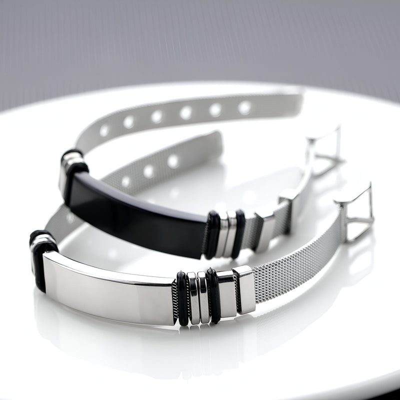 Bracelet gourmette homme acier inoxydable maille milanaise argent et noir, détail anneaux noirs.
