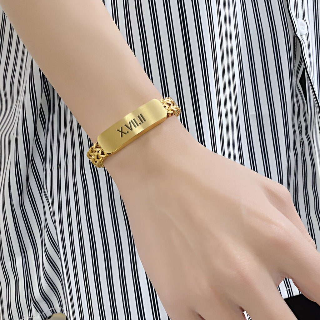 Bracelet gourmette homme en acier inoxydable doré, maille spiga avec gravure personnalisée.