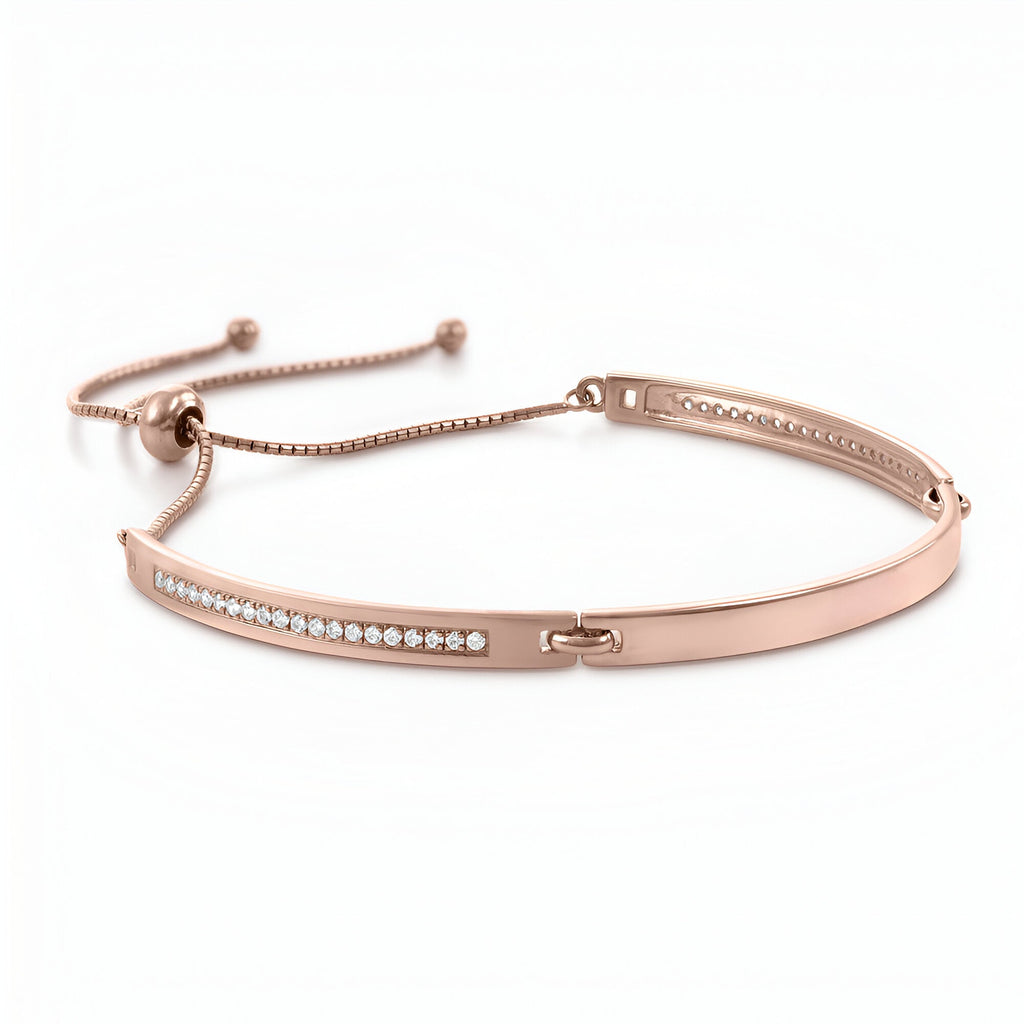 Bracelet gourmette ajustable en or rosé avec rangée d'oxydes de zirconium scintillants.