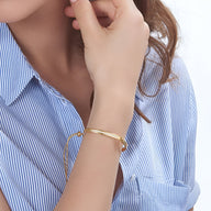 Bracelet gourmette or rosé en argent sterling avec pavé d'oxyde de zirconium, style minimaliste féminin.