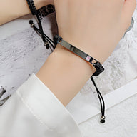 Bracelet gourmette cordon noir avec plaque argentée et pierre de zirconium rose, style mixte Emery.