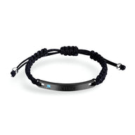 Bracelet gourmette cordon noir avec plaque argentée et pierre de zirconium bleue, modèle mixte Emery.