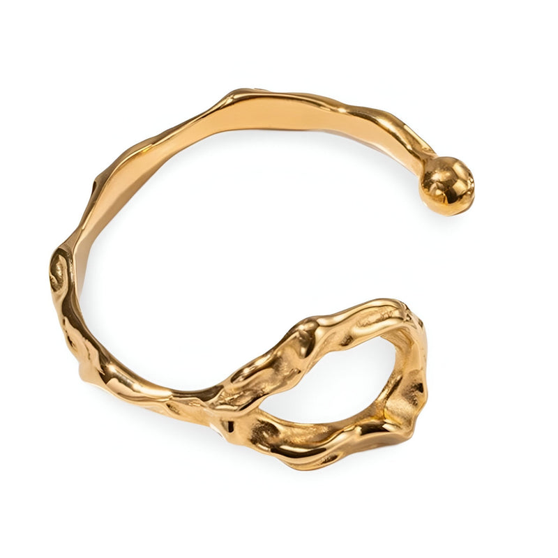 Bracelet jonc doré effet déformé en acier inoxydable avec extrémités arrondies design organique.