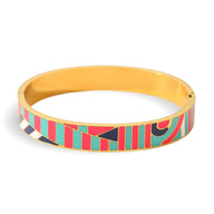 Bracelet jonc doré émaillé avec motifs abstraits colorés rouge, turquoise et noir, modèle Hermance.