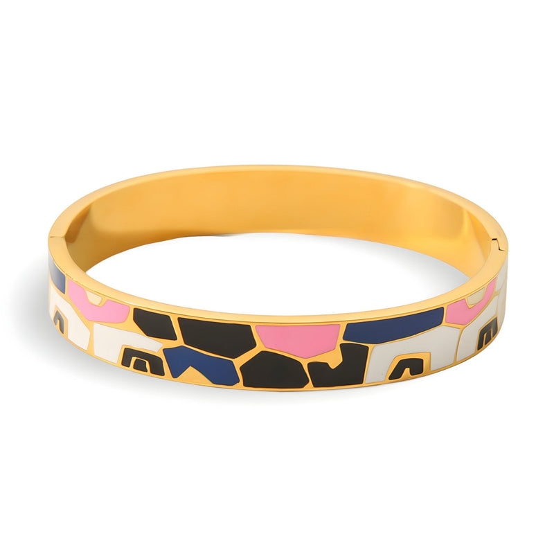 Bracelet jonc émaillé motifs abstraits noirs, roses et blancs, finition lisse dorée.