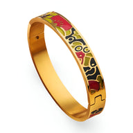 Bracelet jonc doré avec émail noir, rouge et or, motifs floraux abstraits délicats.