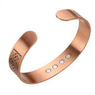 Bracelet jonc en cuivre bronze pour homme avec gravure celtique et aimants intégrés.