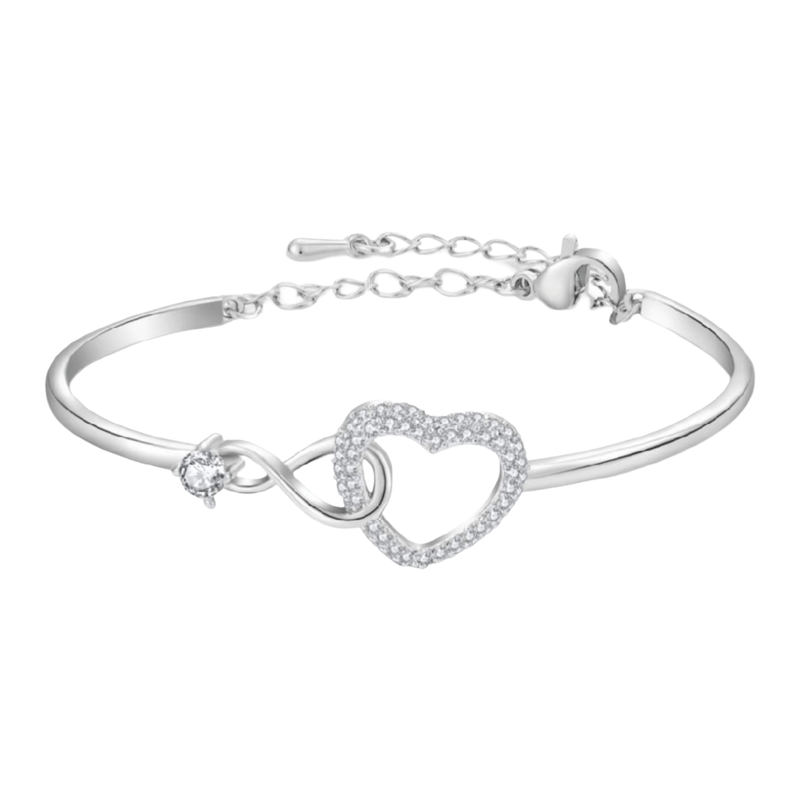 Bracelet jonc en acier inoxydable argenté avec cœur infini pavé de zircons et pierre zircon bleue délicate.