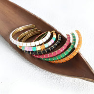 Bracelets joncs multicolores en titane et acrylique, style moderne et épuré, pour femme, modèle Hestia.