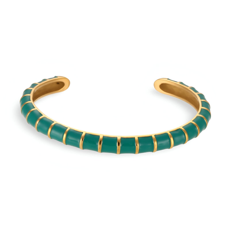 Bracelet jonc en titane or avec segments acryliques verts émeraude pour femme modèle Hestia.