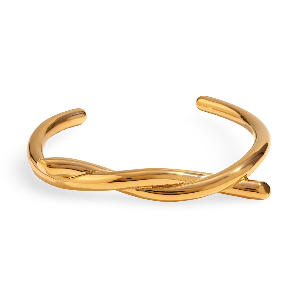 Bracelet jonc en acier inoxydable doré avec demi-noeud élégant et finition lisse.