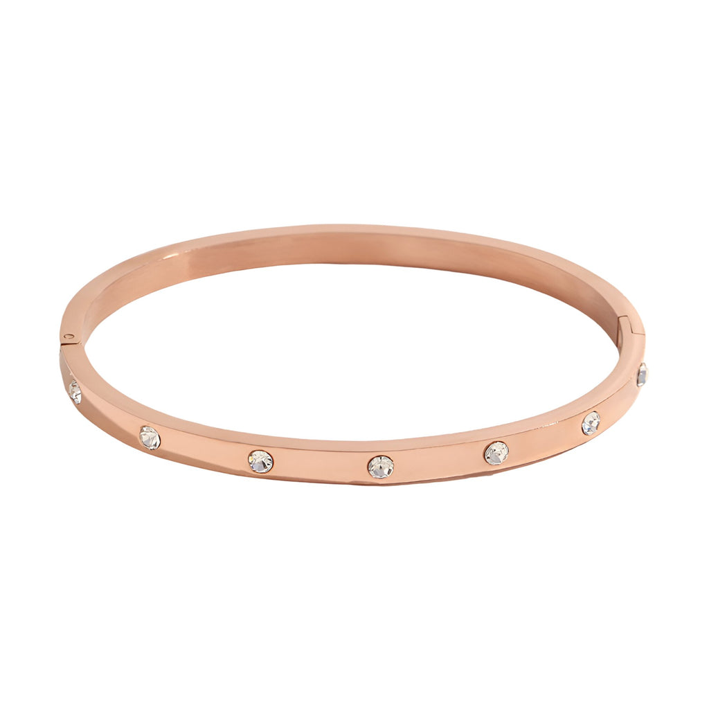 Bracelet jonc en acier inoxydable or rosé avec éclats de lumière sertis circulaires.