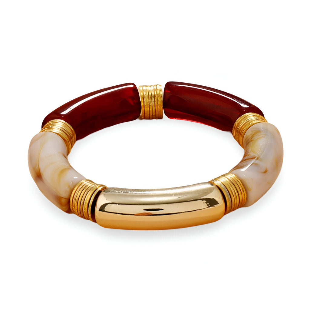 Bracelet jonc bicolore rouge bordeaux et beige en acrylique avec accents dorés élégants.