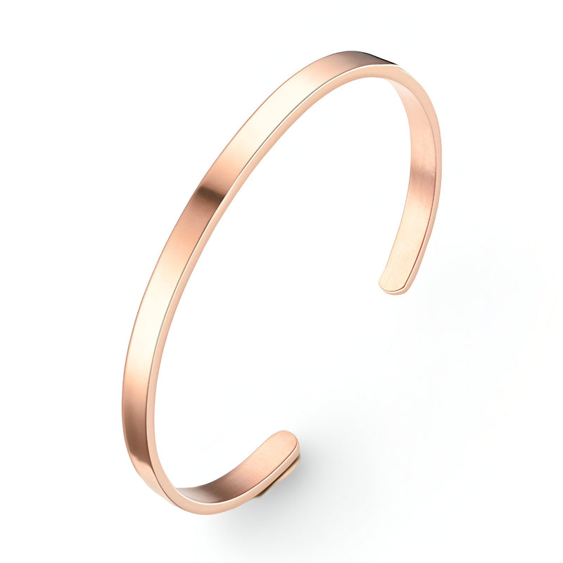 Bracelet jonc en acier inoxydable doré rose, finition lisse et épurée, style moderne pour homme.