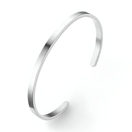 Bracelet jonc en acier inoxydable argenté, design fin et minimaliste, pour homme.