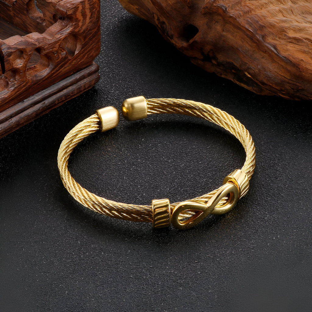 Bracelet jonc doré en acier inoxydable avec motif infini torsadé modèle Kaylo.