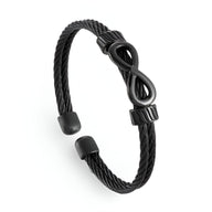 Bracelet jonc noir en acier inoxydable tressé avec motif infini élégant.
