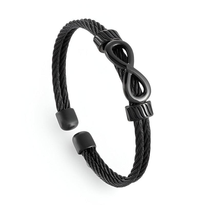 Bracelet jonc noir en acier inoxydable tressé avec motif infini élégant.