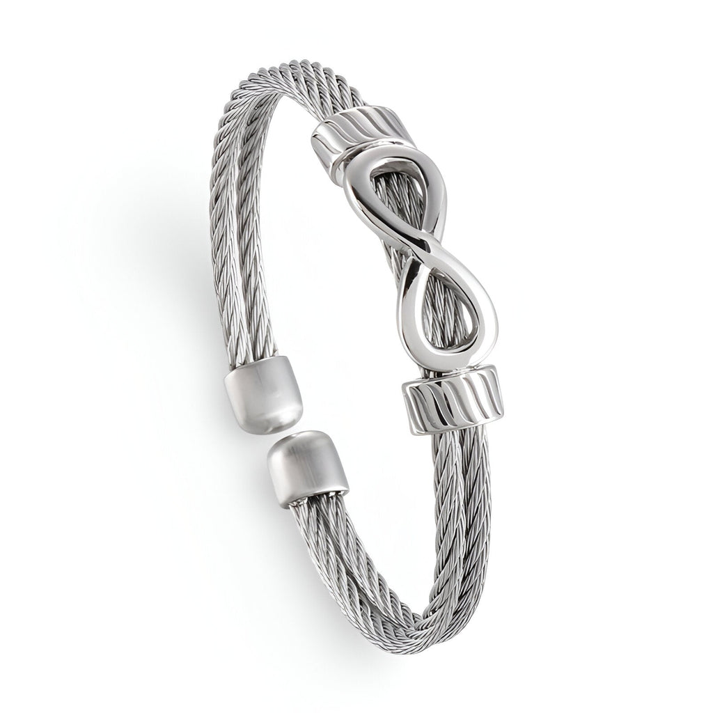 Bracelet jonc en acier inoxydable argenté à motif infini, design câble torsadé, ouverture ajustable.