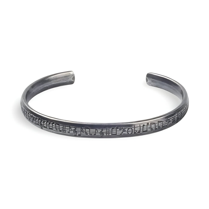 Bracelet jonc en acier inoxydable argenté avec motifs de notes de musique gravées, unisexe.