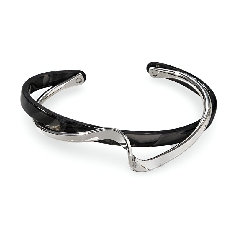 Bracelet jonc femme en acrylique noir marbré et métal argenté au design élégant et moderne.
