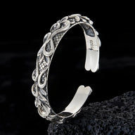 Bracelet jonc en cuivre plaqué argent avec motifs vagues et détails gravés style Arvid.
