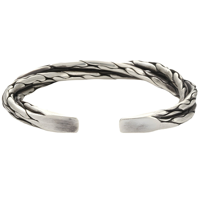 Bracelet jonc torsadé en cuivre plaqué argent pour homme au fini brossé élégant.