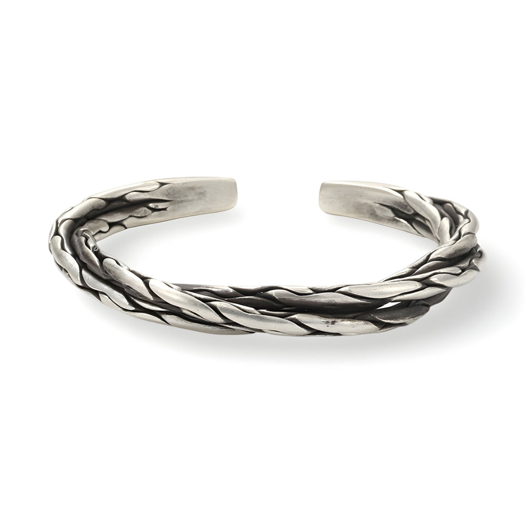 Bracelet jonc en cuivre plaqué argent torsadé, fini brillant, style masculin minimaliste.