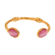 Bracelet jonc en acier doré avec deux perles ovales roses en cristal rose.