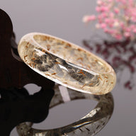 Bracelet jonc en résine, avec fleurs séchées de pissenlit intégrées, modèle Piessa - La Boutique du Bracelet