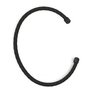 Bracelet jonc fin noir en titane plaqué or avec texture tressée, ouvert aux extrémités renforcées.