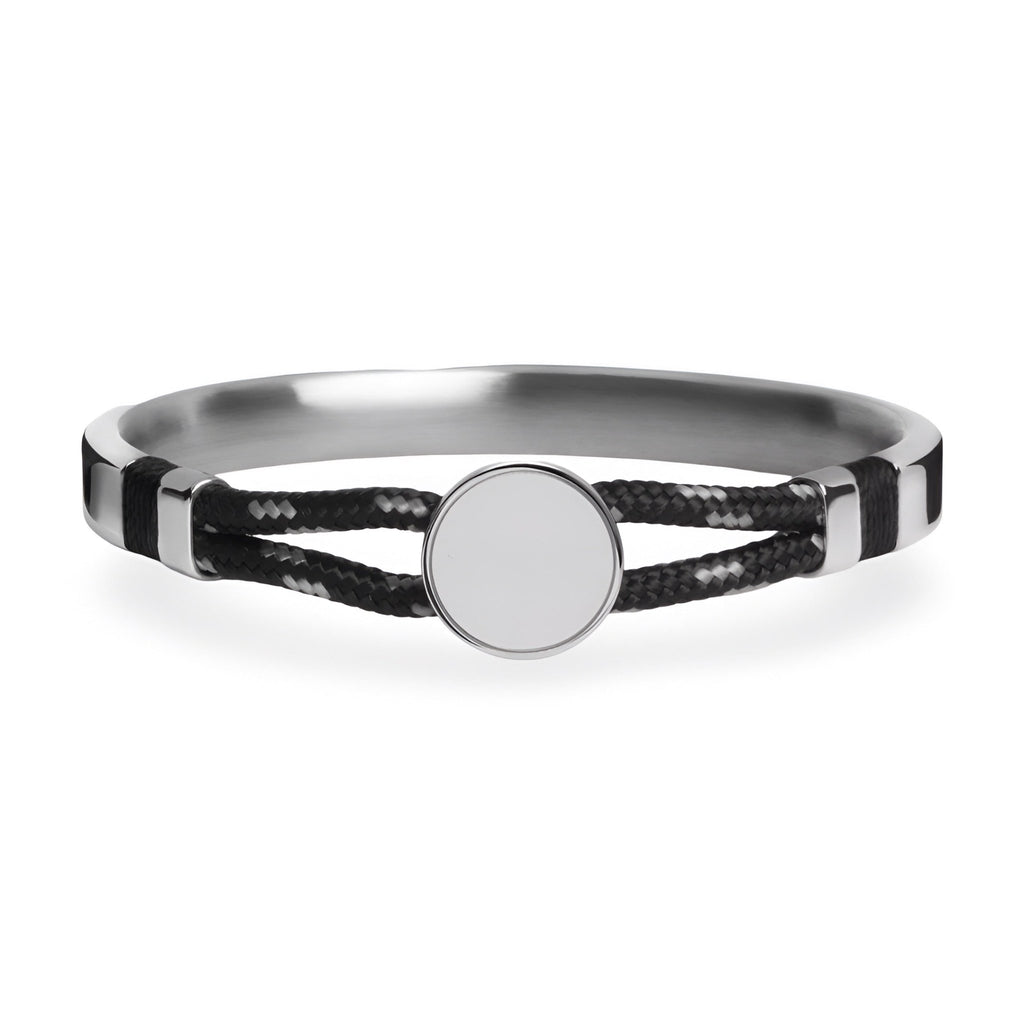 Bracelet jonc argent avec cordon noir tressé et médaillon central lisse rond.