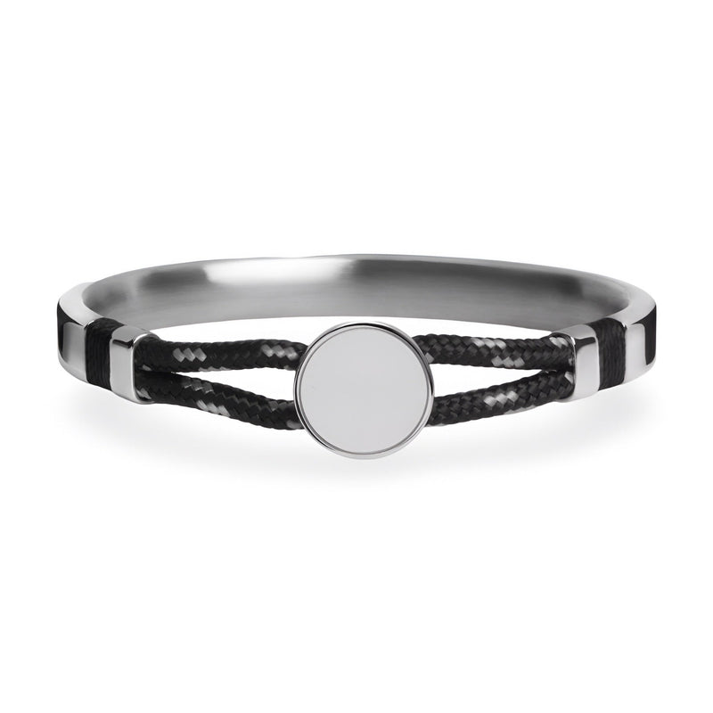 Bracelet jonc argent avec cordon noir tressé et médaillon central lisse rond.
