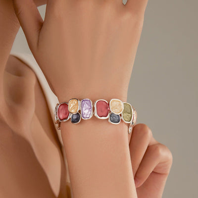 Expandable bangle bracelet with multicolored enameled plates, gold finish, Roka model