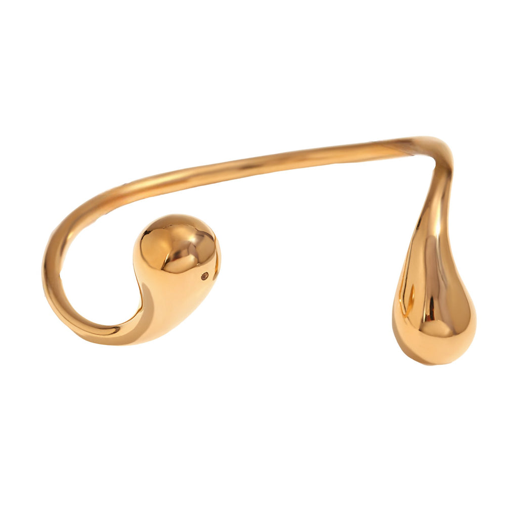 Bracelet jonc en acier inoxydable doré avec extrémités stylisées goutte et boule lisse.