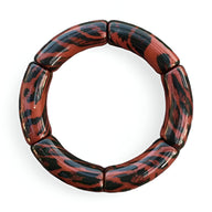 Bracelet jonc en acrylique rouge à motif léopard noir, segments arrondis, pour femme.