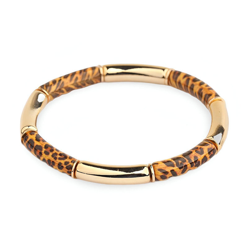 Bracelet jonc pour femme en acrylique avec motif léopard et sections dorées brillantes.