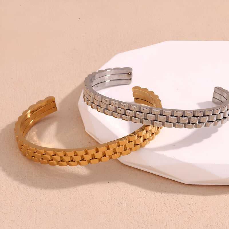 Bracelet jonc maille gourmette en acier inoxydable doré et argenté, modèle Ella, design ouvert élégant.