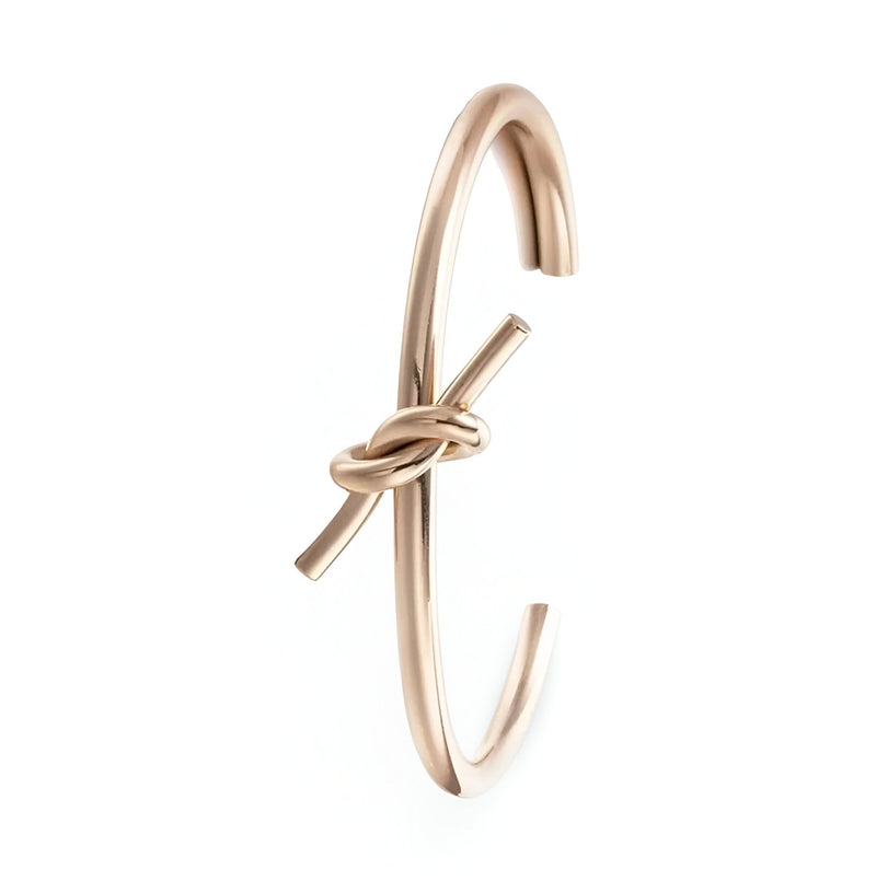 Bracelet jonc en acier inoxydable or rosé avec nœud élégant pour femme modèle Méli.