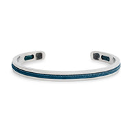 Bracelet jonc argenté avec corde bleu marine intégrée, design fin et moderne pour homme.