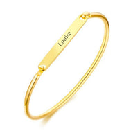 Bracelet jonc en acier inoxydable doré avec plaque personnalisée gravée Louise.