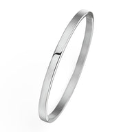 Bracelet jonc fin en titane plaqué argent, design lisse et minimaliste.