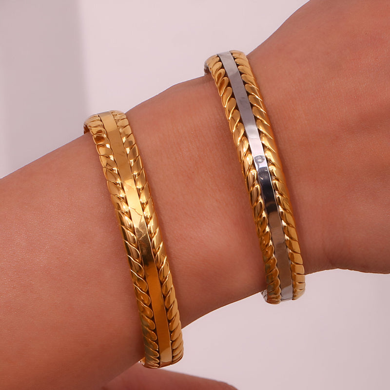 Bracelet jonc tressé en acier inoxydable plaqué or, finitions élégantes, modèle Aglaé, or jaune et bicolore acier et or.