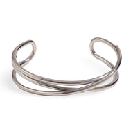 Bracelet jonc argenté en acier inoxydable, design trio torsadé ouvert</br>.
