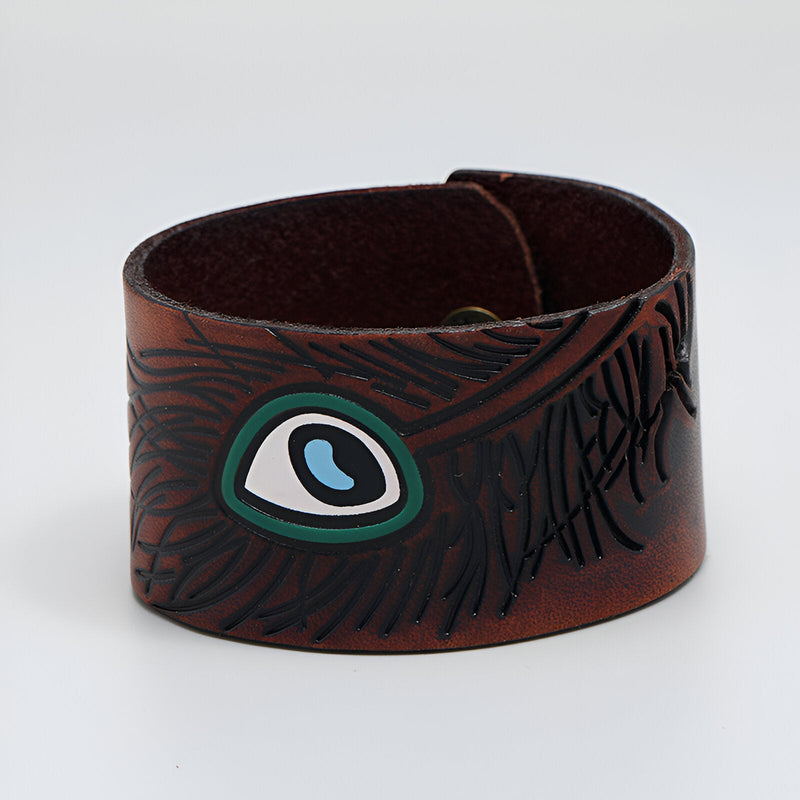 Bracelet large en cuir marron avec dessin d'œil floral vert et bleu, style mixte.